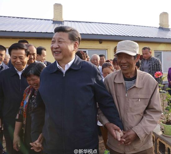 习近平：守着绿水青山一定能收获金山银山